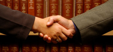 Image of two hands shaking